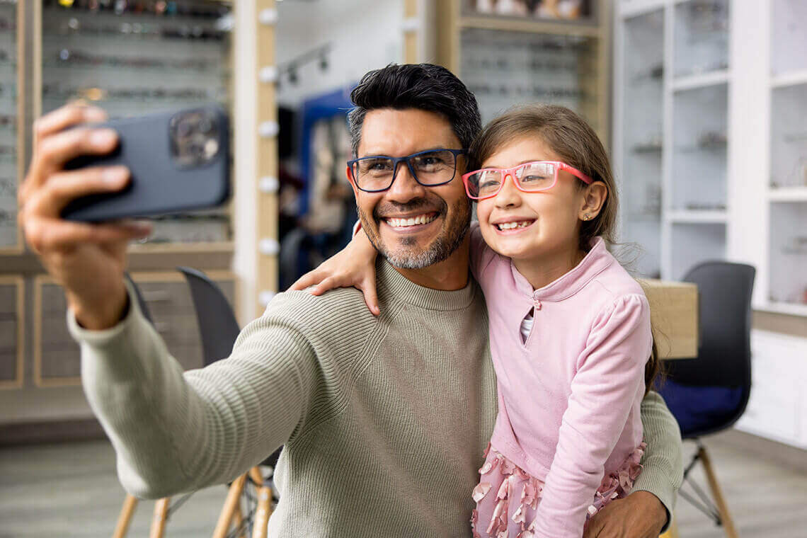 Ocular - Grow your practice - father daughter with glasses Ocular - Grow your practice - father daughter with glasses